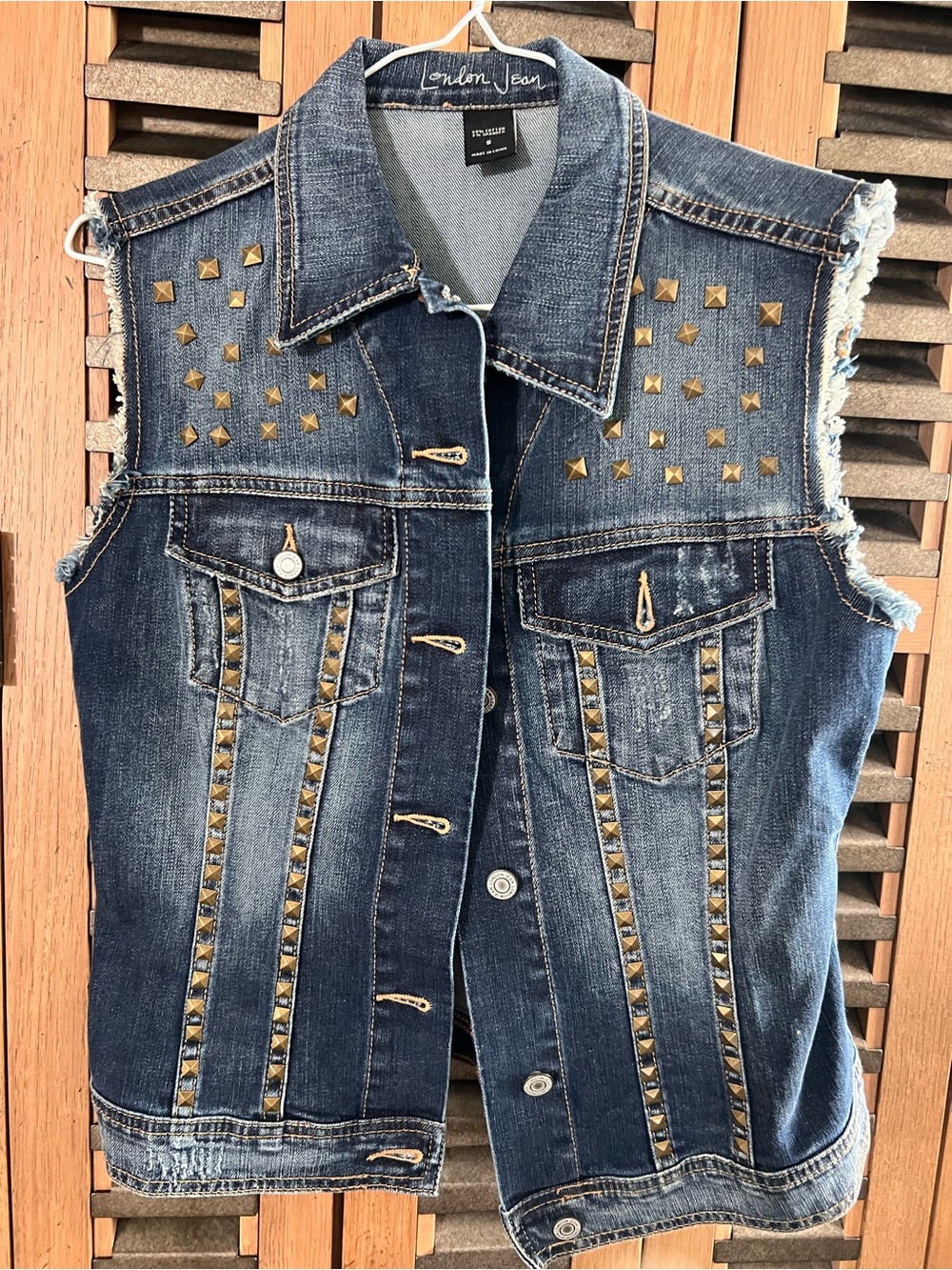 LONDONJEAN Blue Studded Distressed Denim Vest with Gold Accents